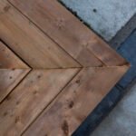 Premium backyard oasis featuring a custom composite deck and modern privacy fence by UBL Group.