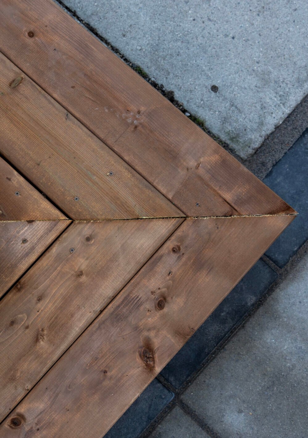 Premium backyard oasis featuring a custom composite deck and modern privacy fence by UBL Group.